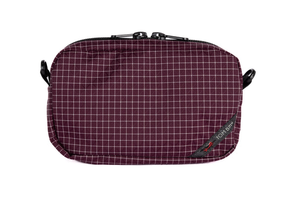 An all-fabric Acai purple with white grid pattern 3D Organizer Cube.